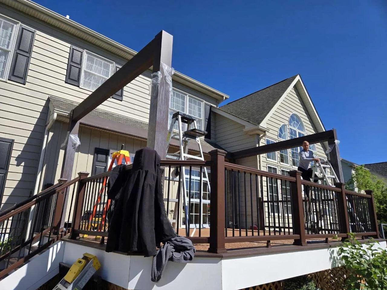 Our crew assembling a pergola frame on a deck in Philadelphia